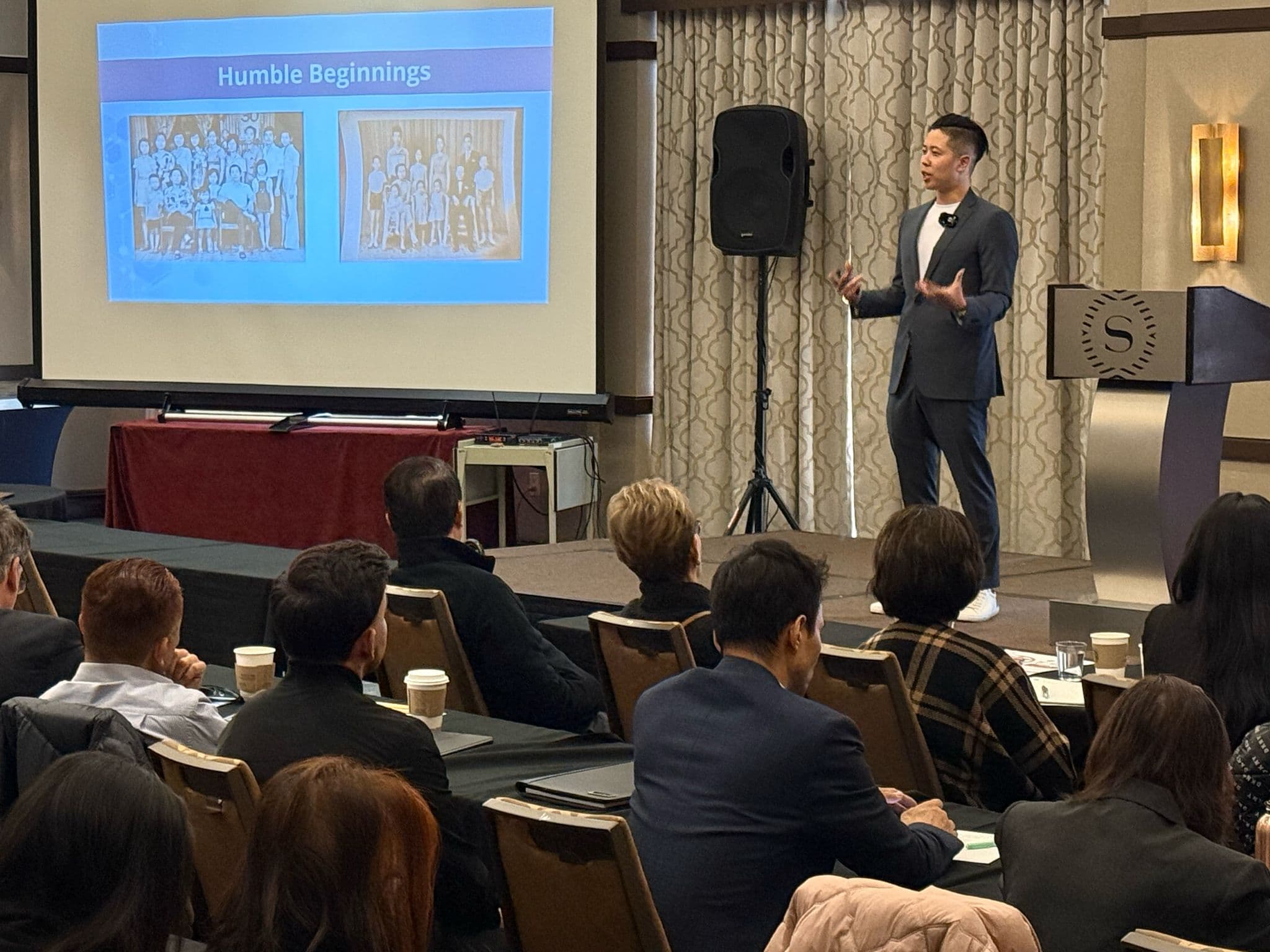 Ray Tran speaking at an RT Invests wealth-building seminar